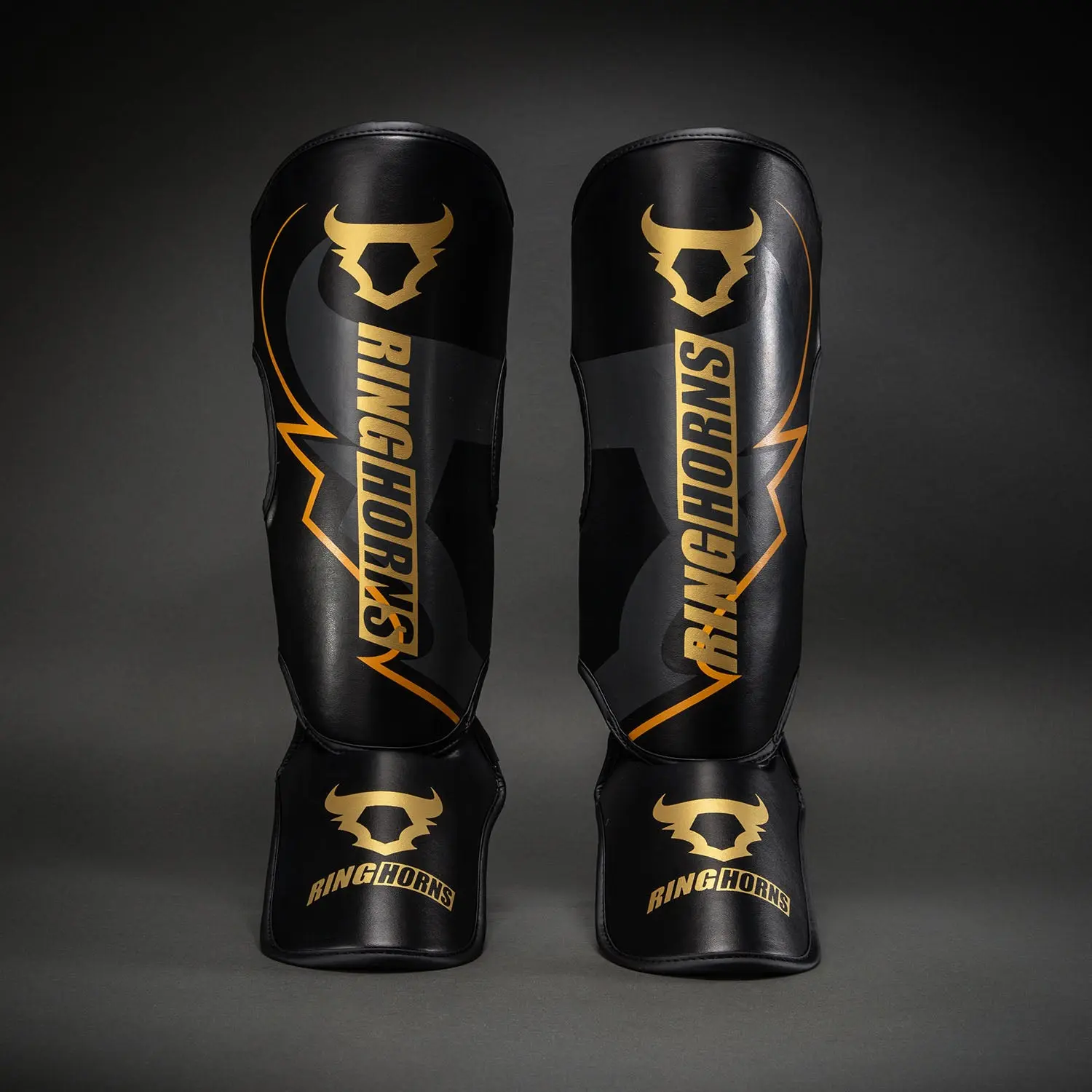 Ringhorns Charger by Venum Shin Guards - Black/Gold